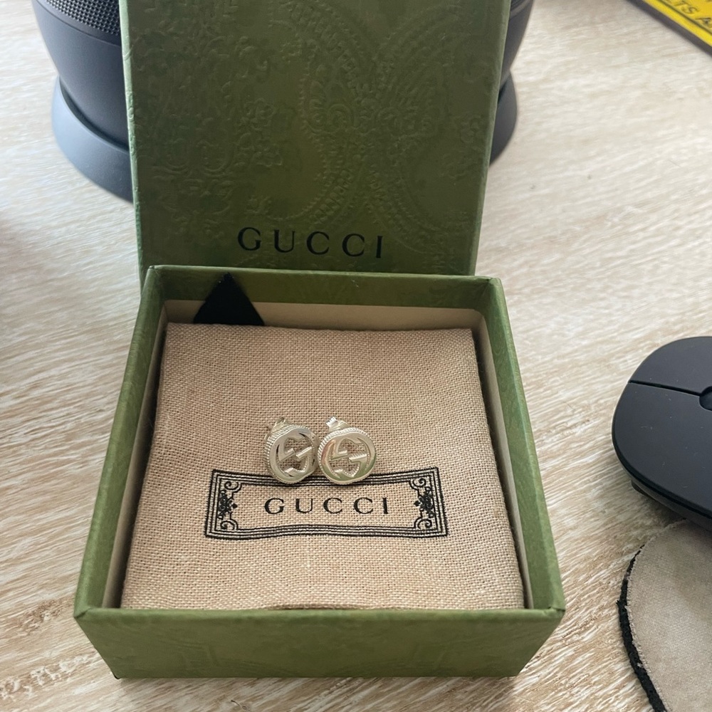Brand new Gucci interlocking earrings silver.